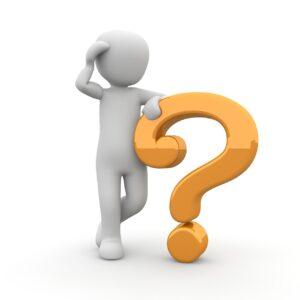 Cartoon person scratching head while leaning on a question mark